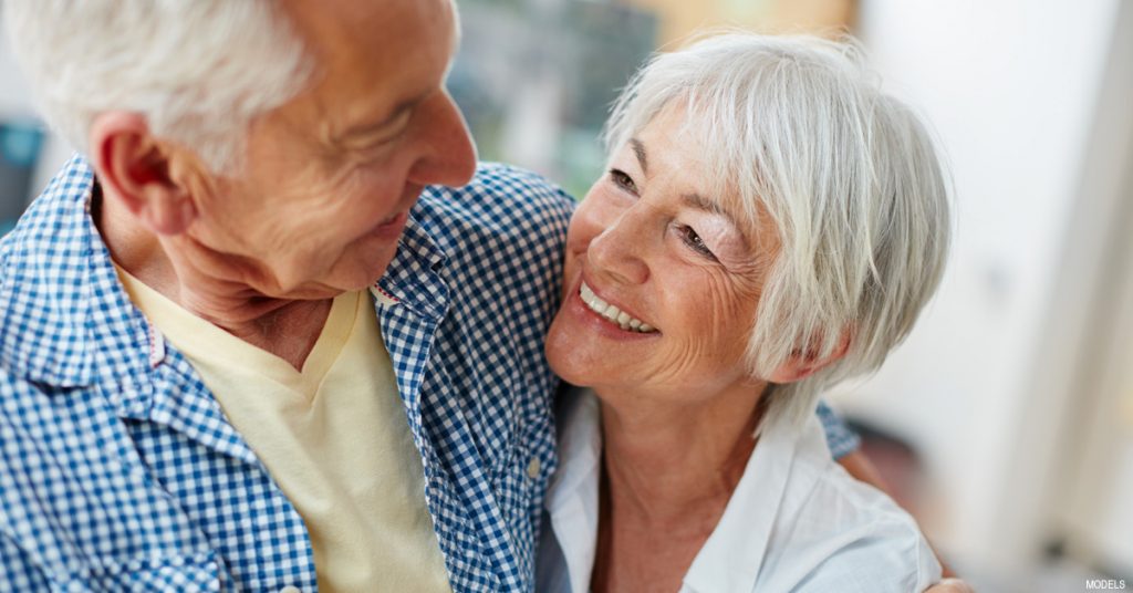 Older couple discussing eyelid surgery in Tucson, AZ