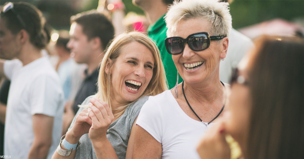 Woman out with her friend after recovering from facelift